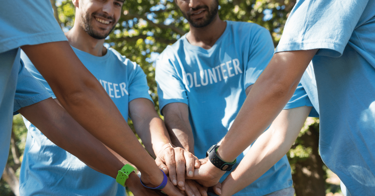 Volunteers-forming-a-handstack.png