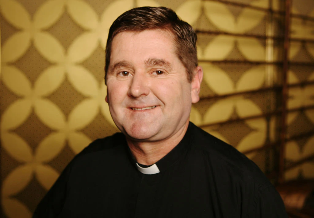 fatherchrisriley080525.jpg