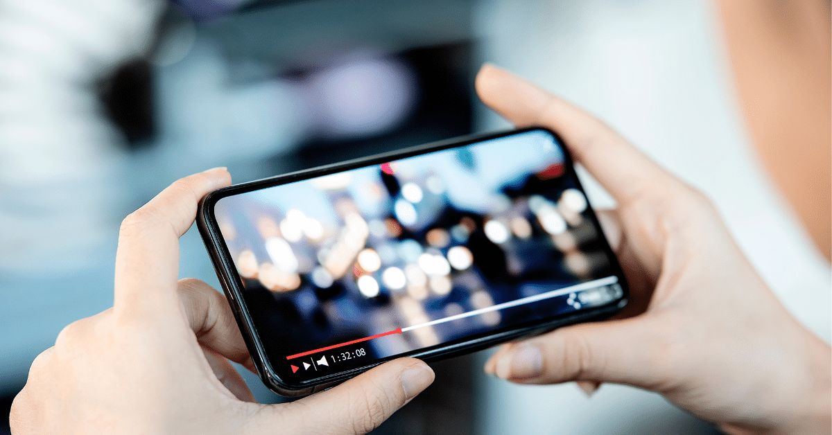 Woman-Watching-Church-Service-On-Smartphone.png