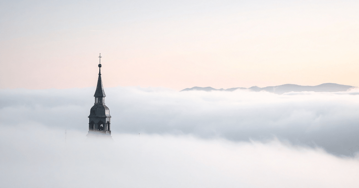 Church-Building-Peeking-Out-Of-Fog-Full-Image.png