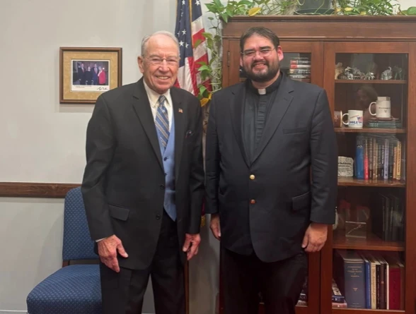 grassley.priest.jpg