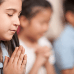 Young-Children-Praying-in-Sunday-School.png